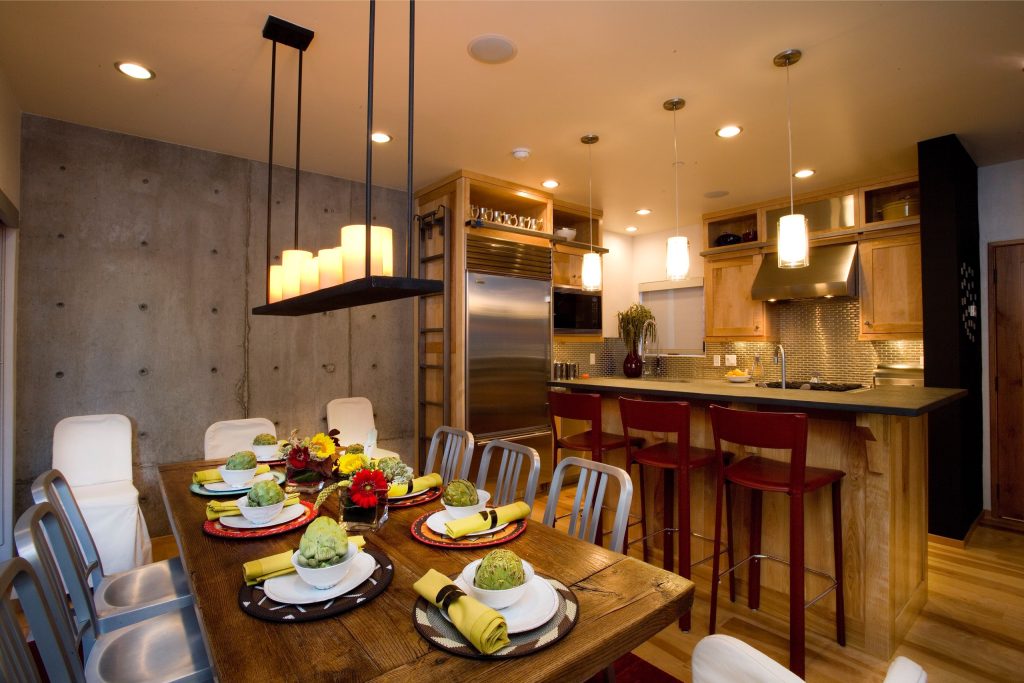 Kitchen and dining room in Kings Crown Triplex in Park City, Utah, architectural design by Elliott Workgroup
