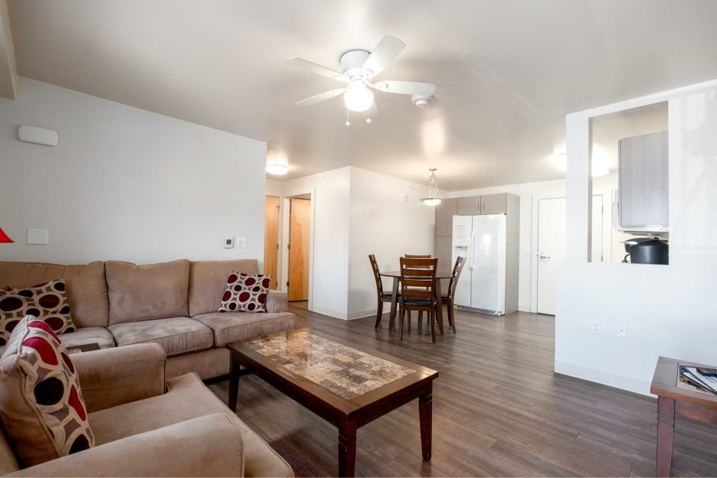 Living room, Empire Avenue Workforce Housing, architectural design by Elliott Workgroup