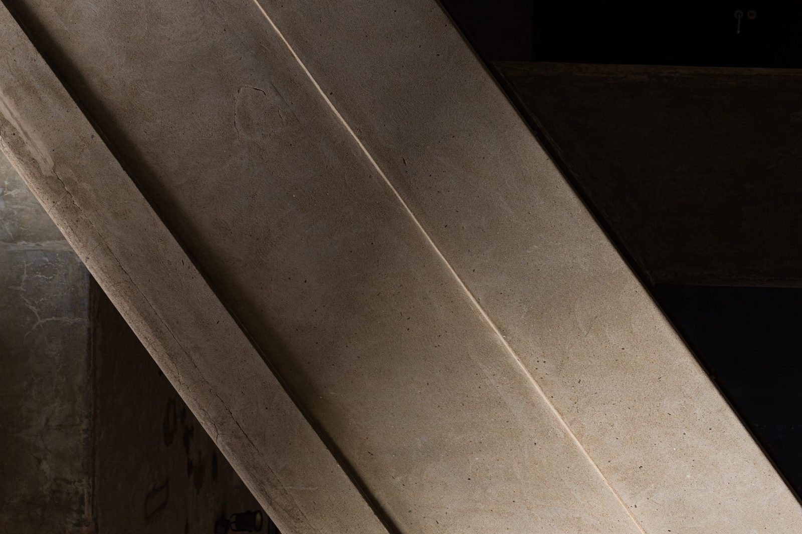 Bronze structural detail in warm light